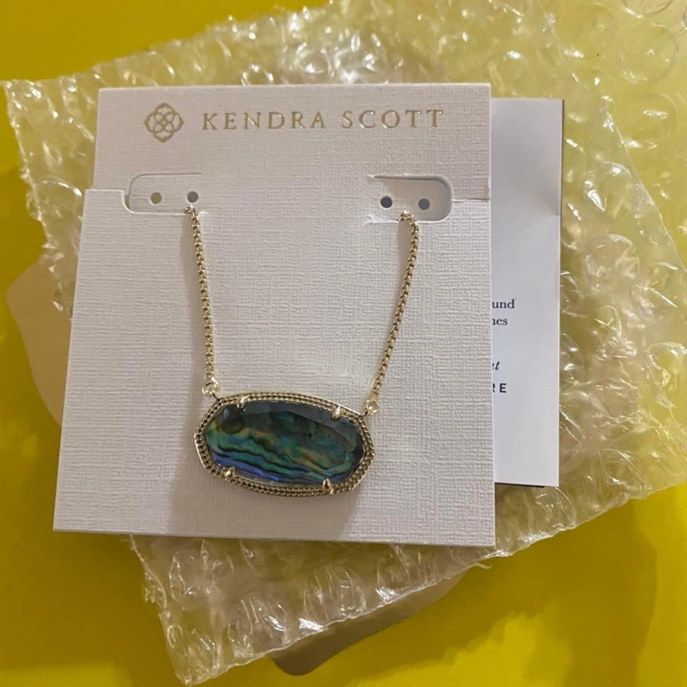 Kendra Scott Delaney new. Gold and alabone shell.